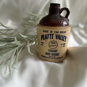 Plate valley old ceramic corn whisky bottle